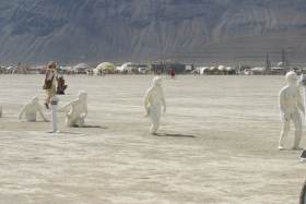Sculptures appear to walk out of the desert
